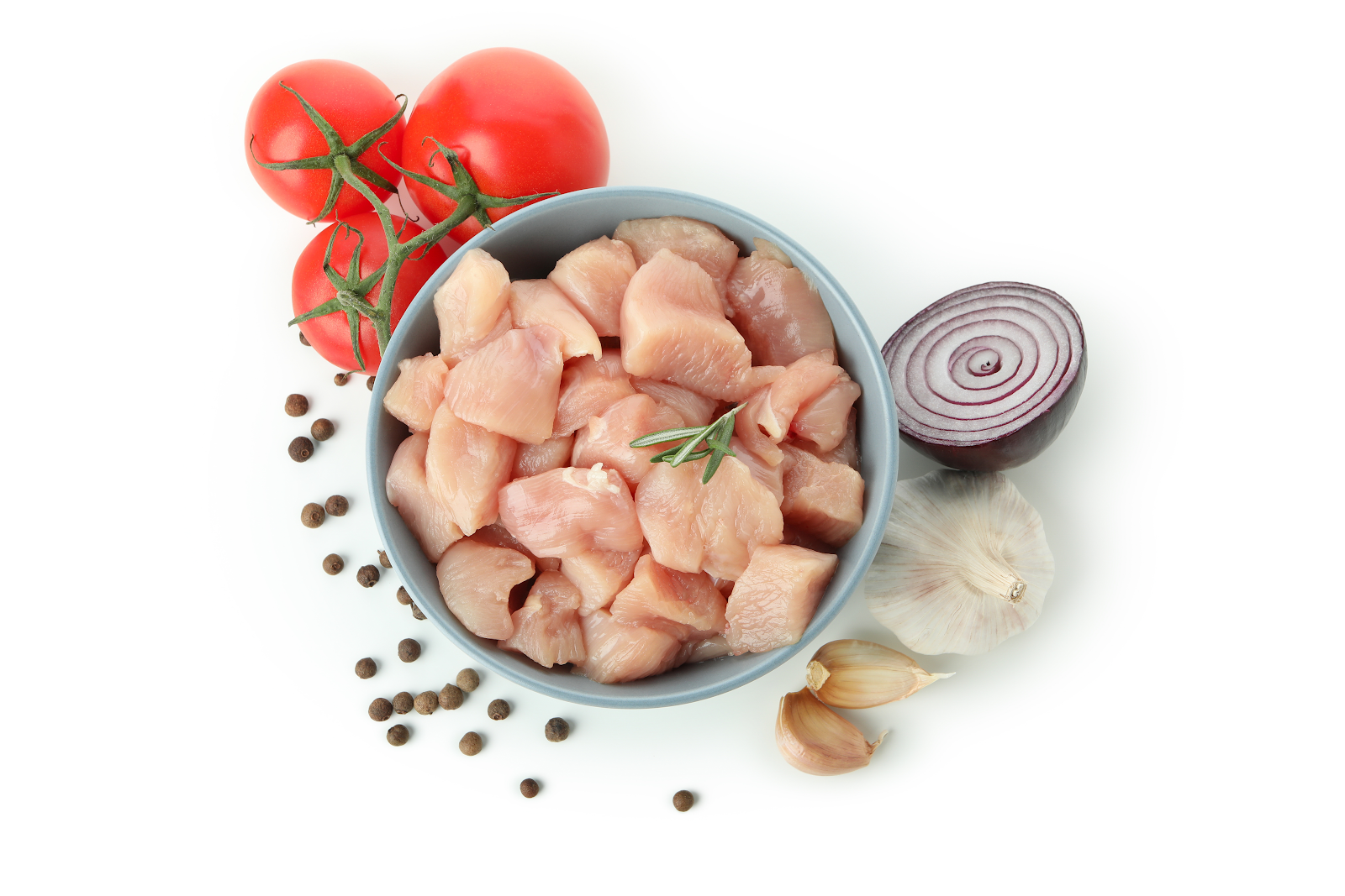 Fresh chicken pieces on marble surface
